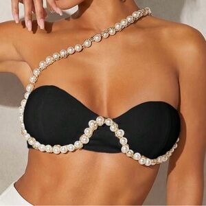 Black top and pants suit